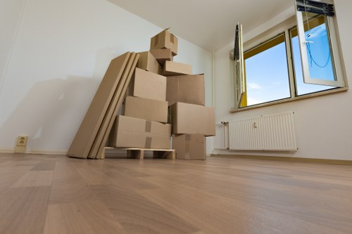 Local team collecting sofas and chairs from a Wembley property