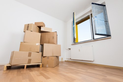 Professional packing team preparing household items in Wembley