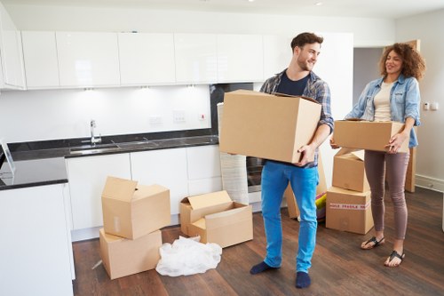 Packed boxes and furniture ready for local transport