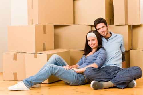 Professional removals team handling household items in Wembley